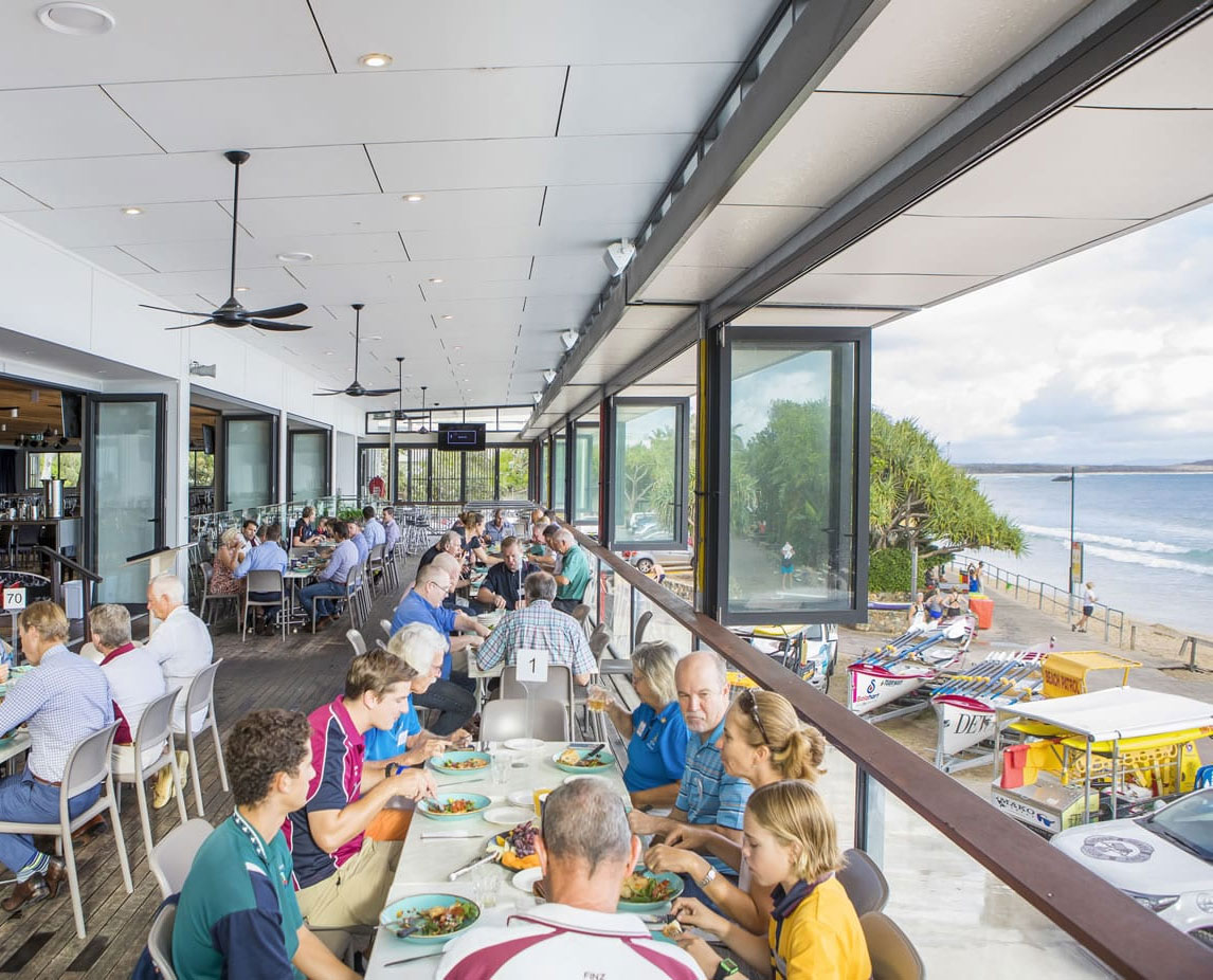 People enjoying the food and the view at Noosa Heads Surf Club in Noosa